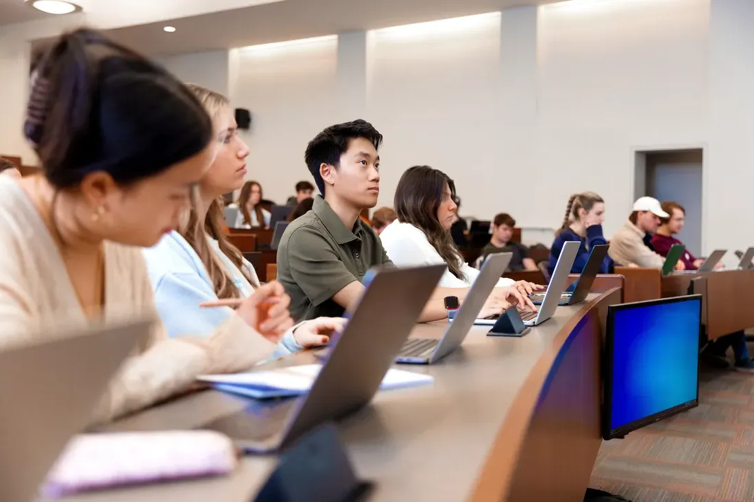 People in a lecture on Syracuse University's campus.